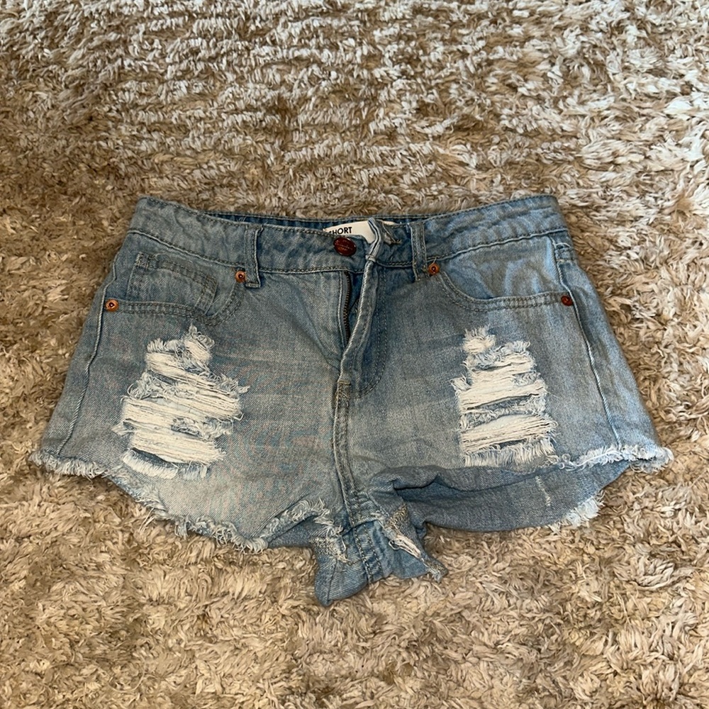 Women’s denim light blue cutoff shorts, size 4